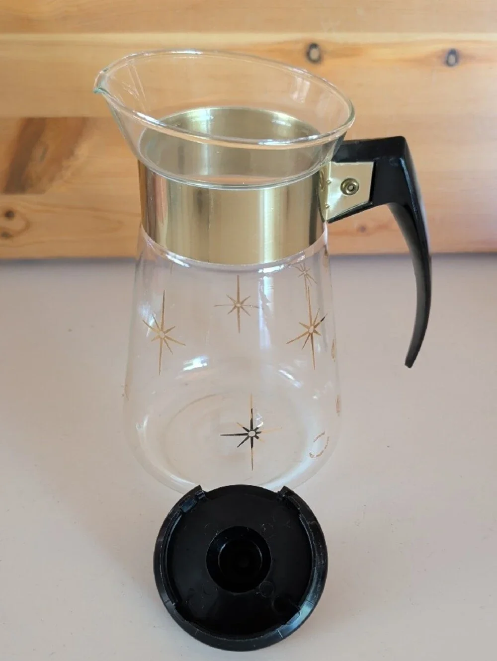 VTG. Pyrex, Heat Proof Gold-Trim Glass Coffee Carafe with Black Handle.